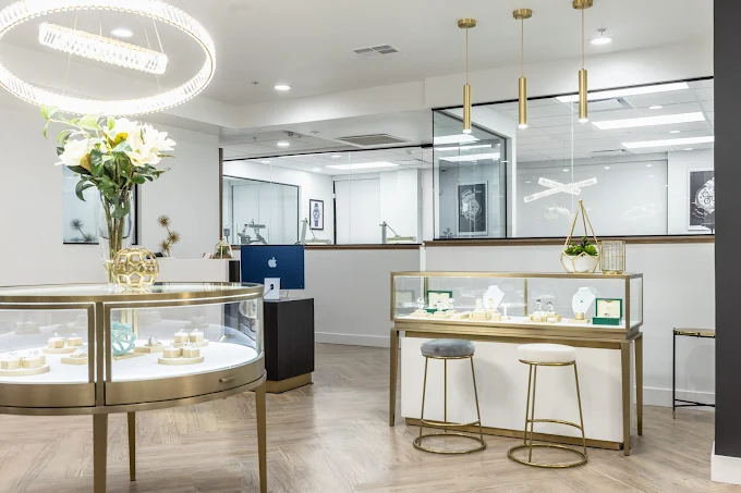 Utah Premier Gold Buyers showroom interior with gold jewelry display cases
